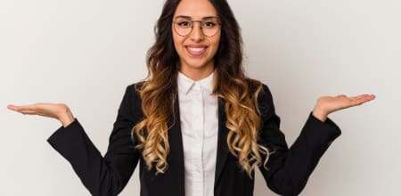 Stock Photos-5 A blend of personal wellness and professional productivity items — featuring a yoga mat, sneakers, laptop, calculator, and office supplies laid out on a hardwood floor.